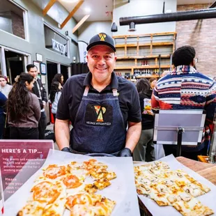 Jesse @ CharQterie with some tasty Pizza squares.