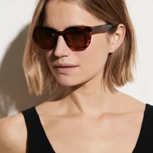 This is what I asked for. Her hair falls just above her shoulders.