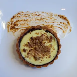 MEYER LEMON TART
 dark chocolate, toasted pecans, chamomile marshmallow