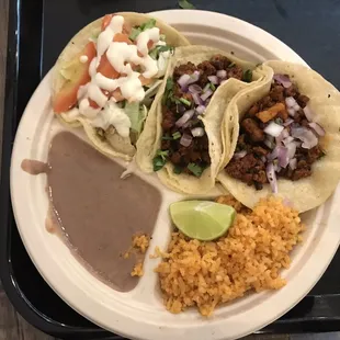 Taco plate with one jack fruit and two el pastor. (Side note: I had already taken the cilantro off)