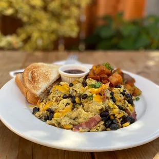 House Scramble w/ bacon, black beans and cheddar cheese