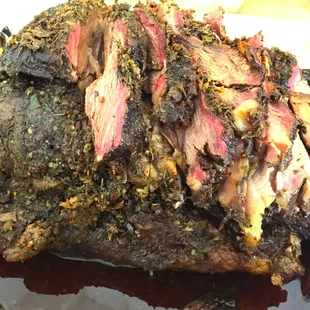 Thinly sliced Angus Itallion Stallion roast with smoke ring &amp; aus jus dipping sauce.