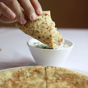 Paneer Paratha with yoghurt sauce