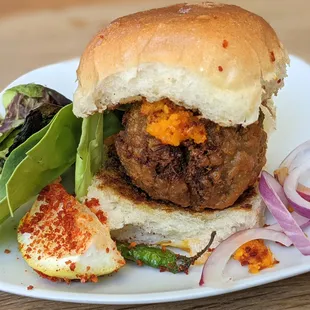 Bombay Vada Pav, spiced Potato Ball Sandwiched Between Two Slices Of Pav.