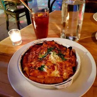Baked risotto with added meatballs.