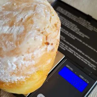 Sugar donut with lemon filling,  weighs nearly 5-oz