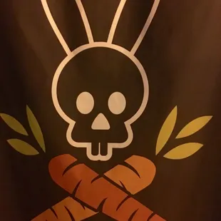 a skull and carrots