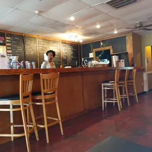 a woman sitting at the counter