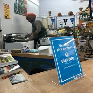 Gentleman preparing my food.