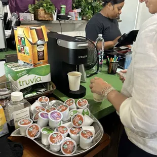 a woman preparing coffee