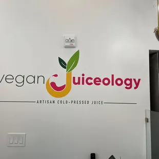 Logo behind front counter