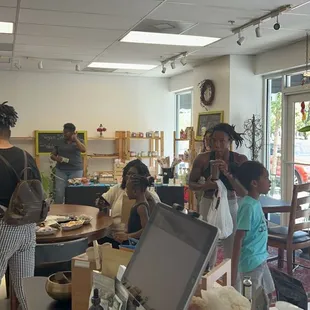 a group of people in a cafeteria