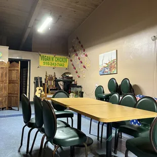  long table with green chairs