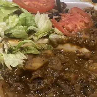 Oxtails served over rice and peas.