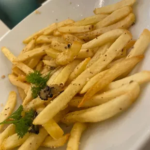 Vegan Parmesan, black truffle, french fries.