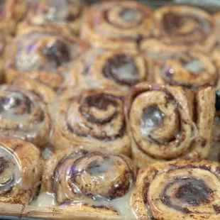 a tray of cinnamon rolls