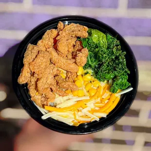 Vegan Comfort Food Bowl with mashed potatoes, gravy, corn, kale and vegan chicken