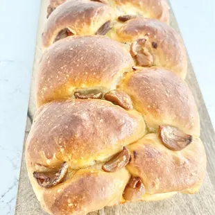 a loaf of bread on a cutting board
