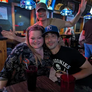 a man and a woman sitting at a table