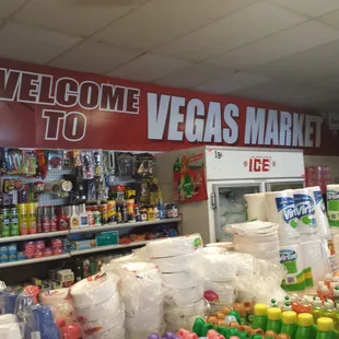 a store with a sign that says welcome to vegas market