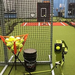 Slow pitch and fast pitch softball pitching machines.