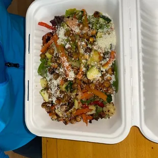 Bowl with beans and cotija cheese.