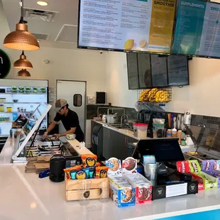 a man working behind a counter