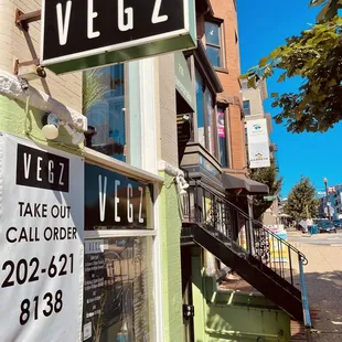 a street sign in front of a building
