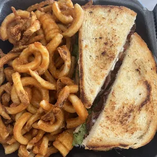 Cali Club with seasoned curly fries.