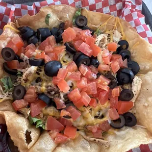 Taco Salad only comes with your choice of meat, lettuce, tomato, olives and cheese. I highly recommend you add rice and beans.