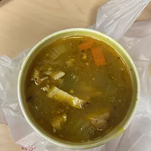 Chicken soup, so good with veggies and rice.