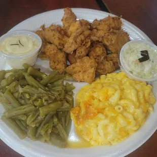 Catfish nuggets, Mac n cheese, green beans, Coleslaw, tarter sauce. The hushpuppies are covered up.
