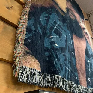 a tapestry hanging on the wall