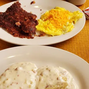Biscuits and gravy scrambled eggs and cheese corn beef hash sausage and choose omelet home fries and coffee