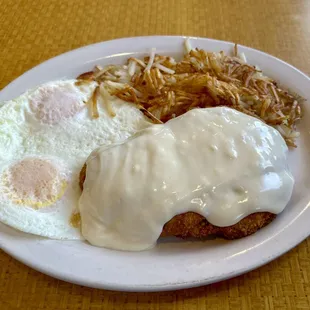 Country fried steak with gravy, eggs and a small order of hash browns, as requested. Excellent!