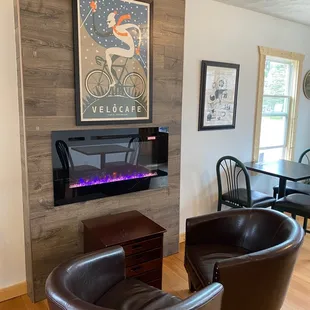 two chairs and a table in a living room