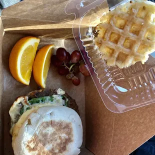 Egg muffin sandwich with pepper jack, spinach, walnut Patty, with fruit on the side and a specially made for me potato cake!!!