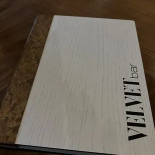 a close up of a book on a table