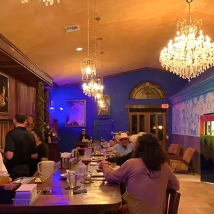 people sitting at a long table