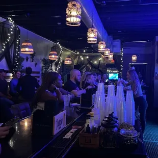 people sitting at the bar