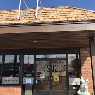 a man standing in front of a store