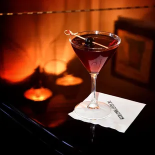 a cocktail in a martini glass