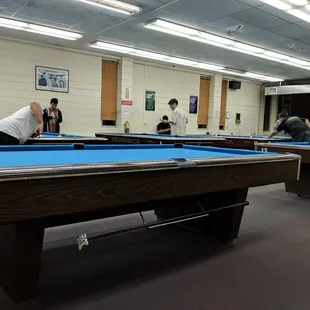 people playing pool
