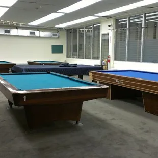 Front area with 3 premium tables and 2 Billiard (pocketless) tables