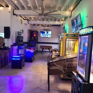 a game room with arcade machines