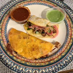 Quesabirria and al pastor taco
