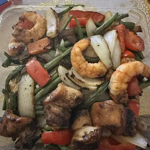 Chicken and shrimp kabob combo with veggie fried rice and stir fry veggies!