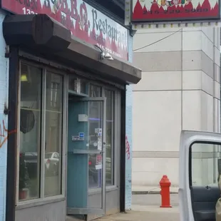 a car parked in front of the restaurant