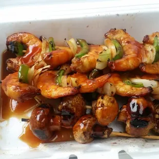 2 shrimp kabobs with mushrooms