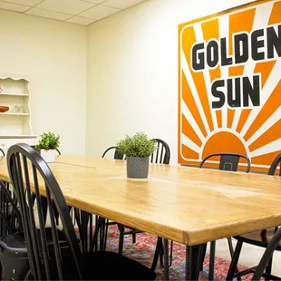 a wooden table and chairs